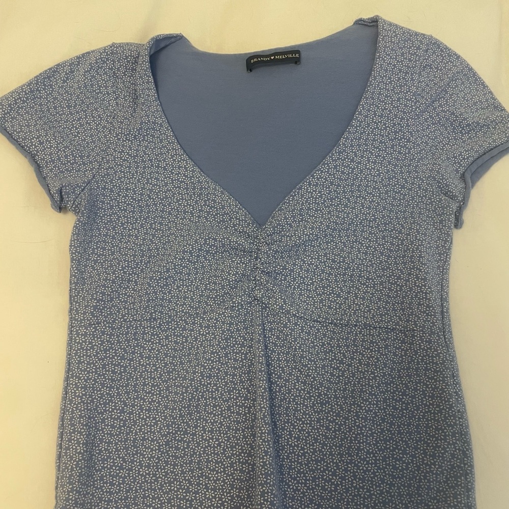 light blue brandy melville shirt with flowers